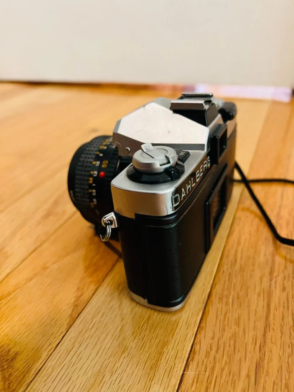 vintage Minolta XG-9 35mm SLR film camera equipped with a 50mm prime lens